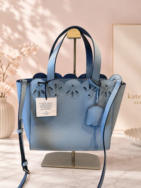 Kate Spade Handbags - Kate Spade Magnolia Street Eyelet Mini Mina purse